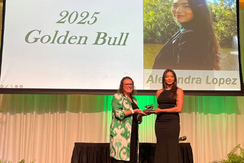 woman getting an award