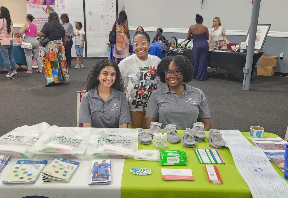 group of women at tabling event