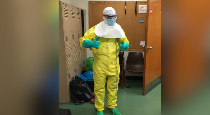 a person in a hazmat suit