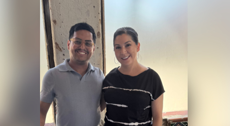 two people smiling