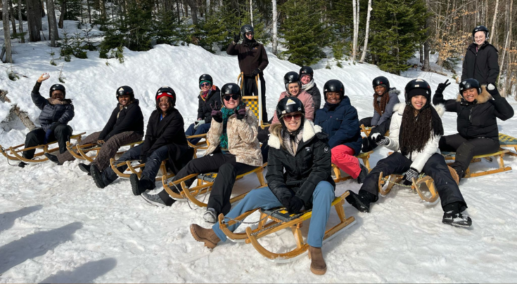 a group on a snow patch