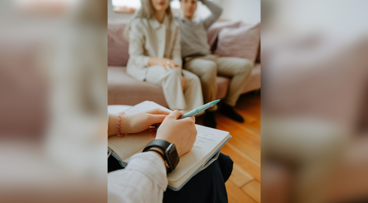 A couple experiencing a prenatal interview.
