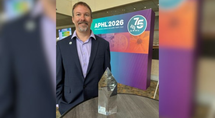 Corrigan with his award.