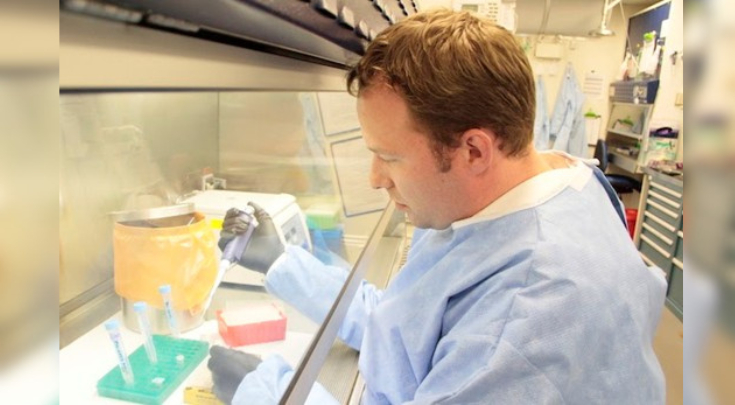 Jeremy Corrigan working in the Humboldt County Public Health Laboratory in Eureka, Calif.  