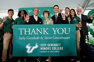 President Judy Genshaft and her husband, Steve Greenbaum, with others at the event honoring her historic gift. 