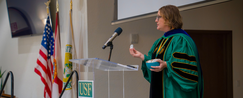 Dr, Cayla Lanier leads students in an activity to cement their legacy at the Sarasota-manatee campus.
