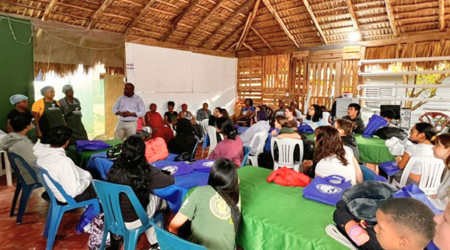 Students listen to members of the Kerolle initiative