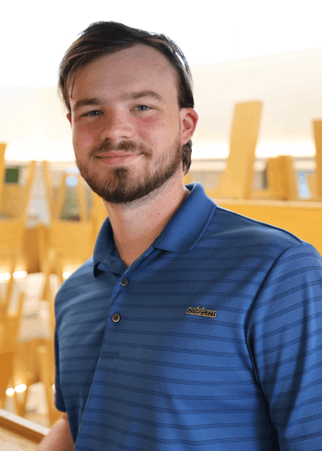 Ethan Tracy headshot in Honors building