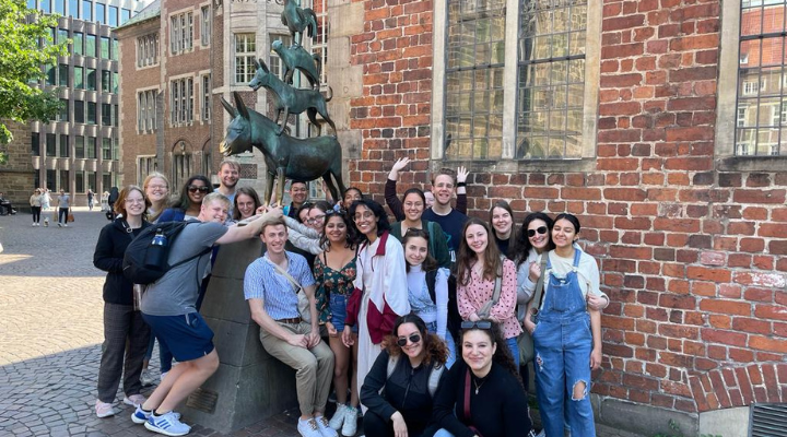 Students smile for a group photo