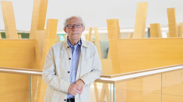 Henry McLeish headshot overlooking the Honors atrium