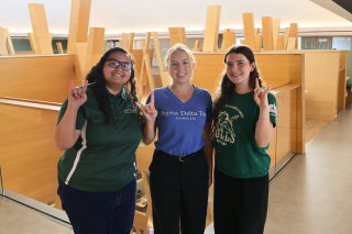 Katrin, Alex, and Skylar pose in the Honors College