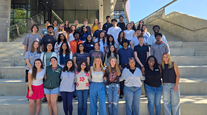 Judy Genshaft Honors College peer mentors pose outside the Tampa Honors building