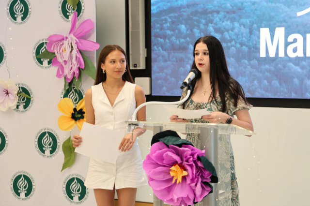 Climate Teach-In Co-Presidents stand at podium