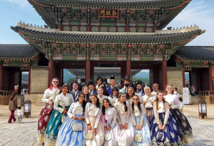 Students and faculty on the South Korea abroad trip dress in traditional Hangbok.