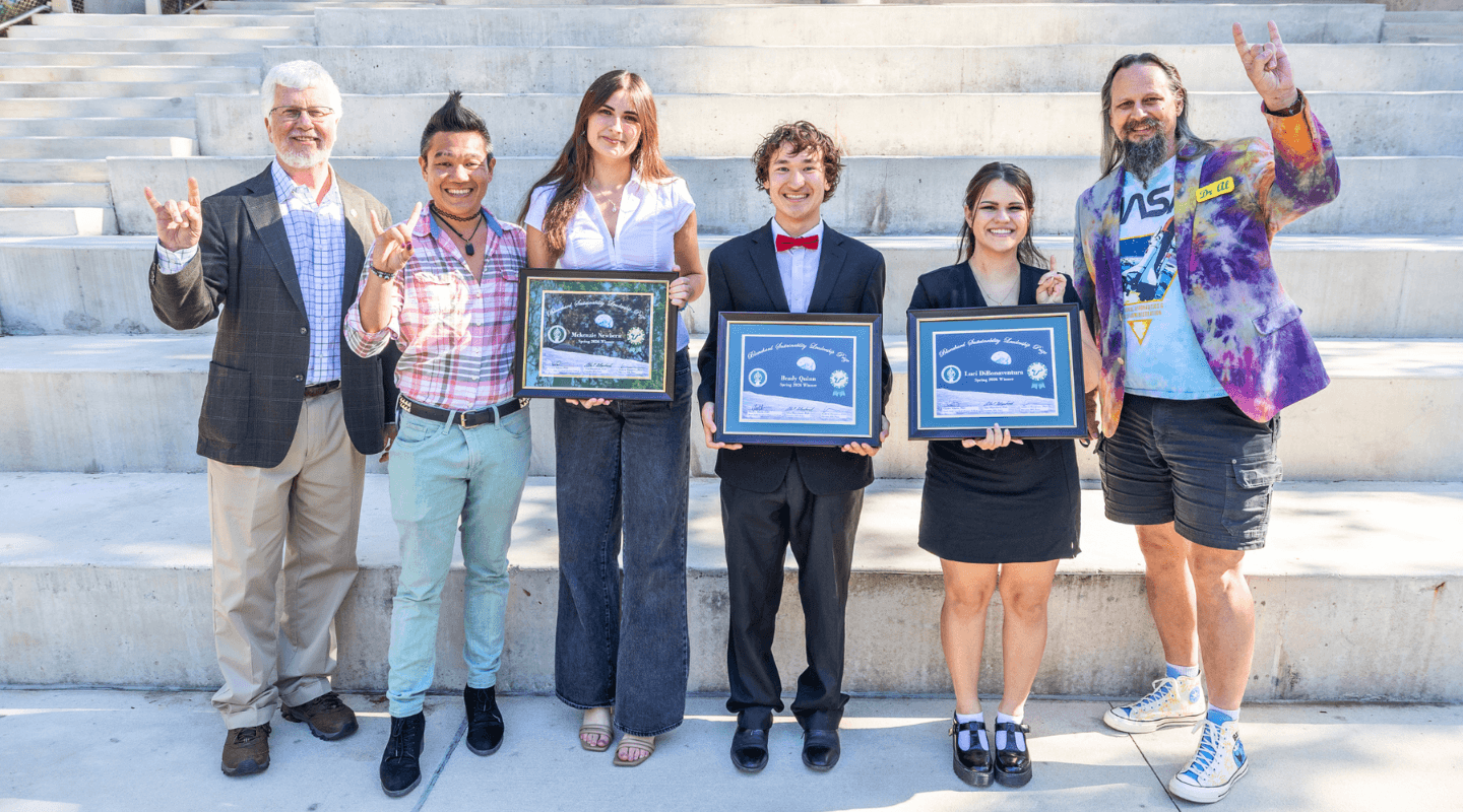 From left to right: Dean Charles Adams, BSL Prize Director Dr. Andrew Hargrove, Mckenzie Newbern, Brady Quinn, Luci DiBonaventura, and Dr. Al Blanchard.