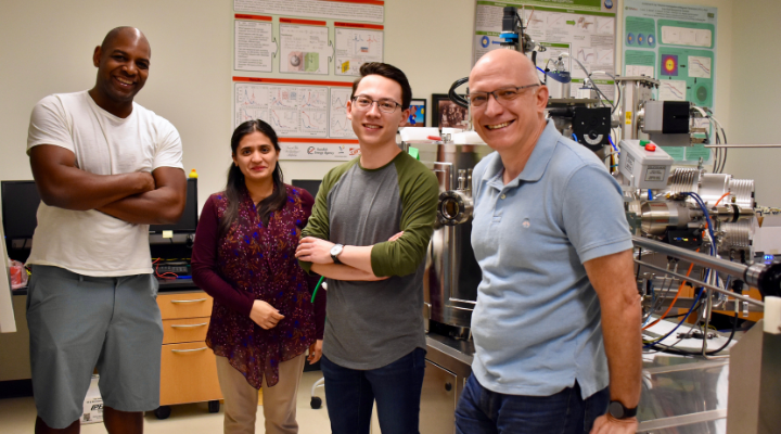 Faculty and students in a USF research lab