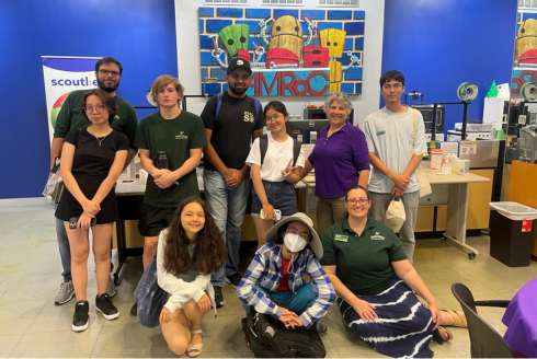 Judy Genshaft Honors College students and staff pose for a picture in the AMRoC Fab Lab in Tampa.