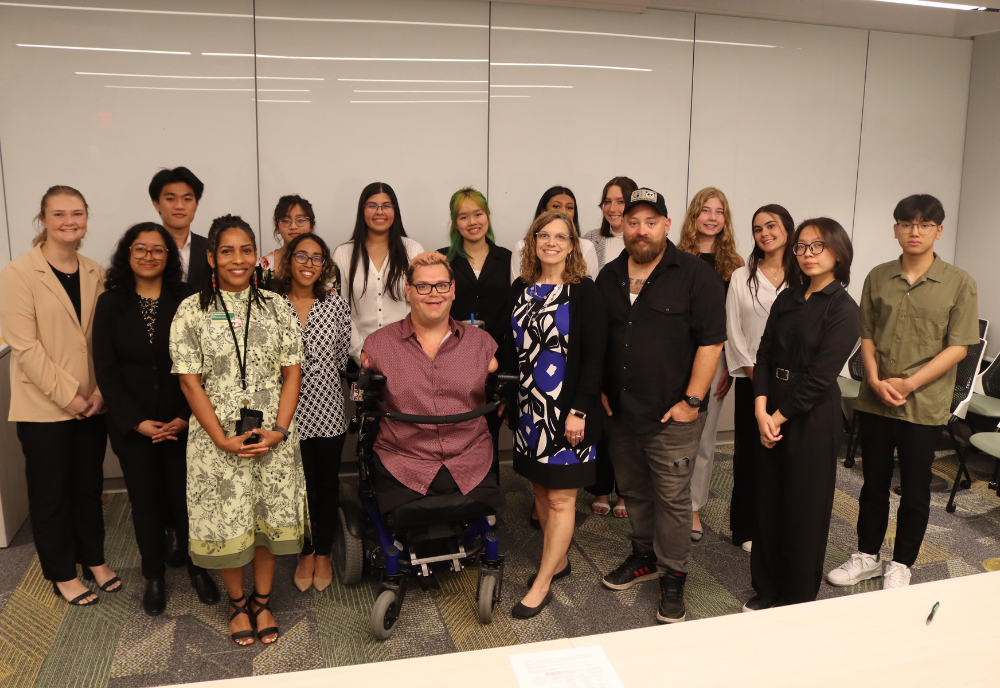 The students, judges and faculty that participated in the Grand Challenge competition smile for a group photo. 