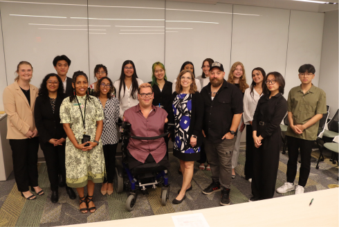 The students, judges and faculty that participated in the Grand Challenge competition smile for a group photo.