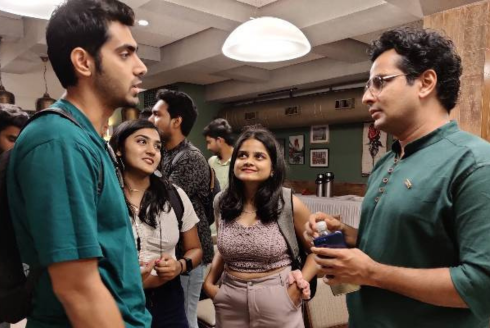 Actor and former USF Honors instructor, Ojas Rawal speaks to a group of students