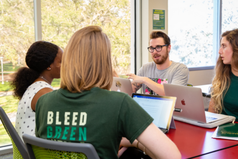 Students engaged in a group meeting