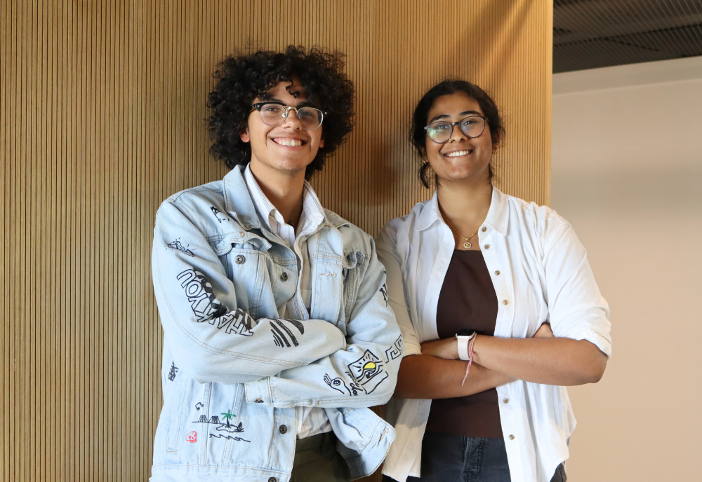 Honors Peer Mentor Leads Joseph Ambrosino and Tanmayee Kanagala smile side by side for a photo.