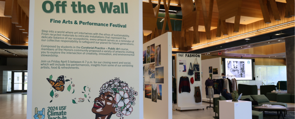 Sustainability-themed student art, posters, sculpture and fashion at the Off the Wall Art Gallery in the Judy Genshaft Honors College building.