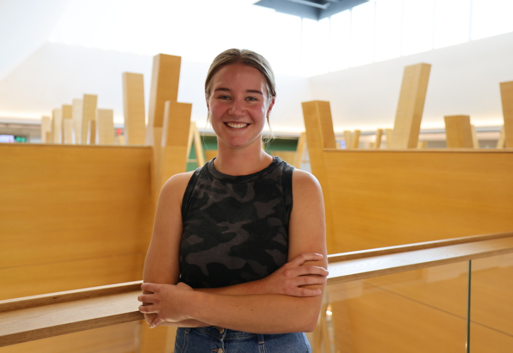 National Merit Scholar Daelyn Quinn poses in the USF Judy Genshaft Honors College