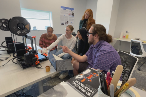 USF honors students work with Professor Tina Piracci and Dr. William Ellis to engineer oyster bricks.