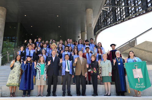 University of South Florida leaders including President Rhea Law, Dr. Judy Genshaft, Steven Greenbaum, and Provost Prasant Mohapatra smile with the class of 2024 USF PBK inductees.