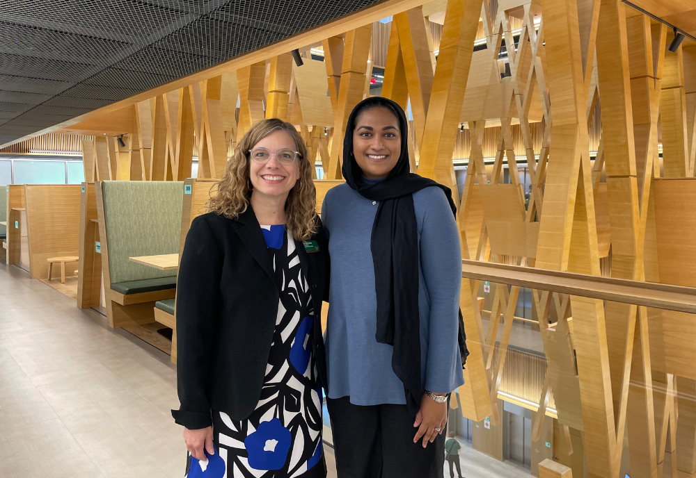 Honors alum Sana Baban and Dr. Lindy Davidson pose in the Judy Genshaft Honors College