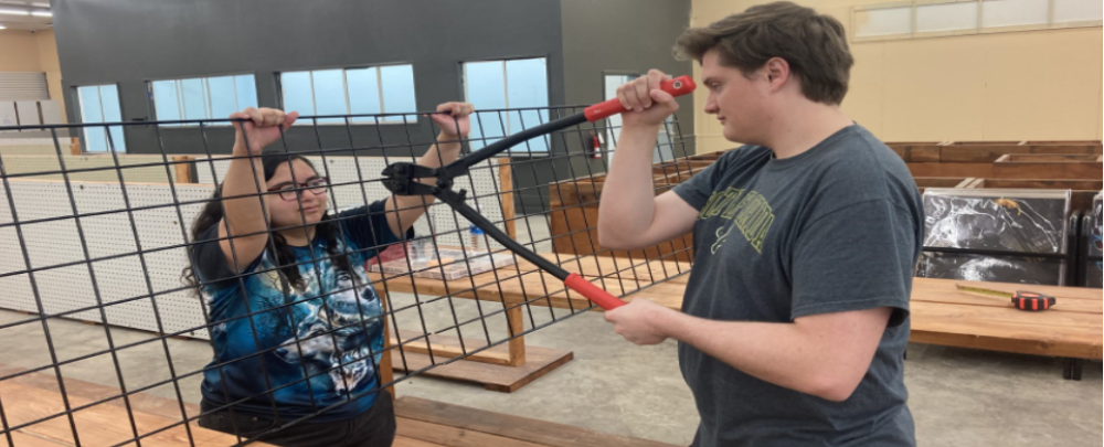 Honors students volunteer at Habitat for humanity. 