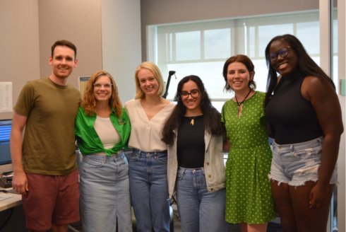 Honors alumni Dr. Ife Bolujo, Dr. Trent Lippert, Dr. Karina Bowers, and Dr. Sarah Awshah smile with Dr. Lindy Davidson and the student host in the AV studio.