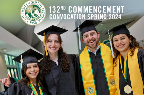 USG graduating seniors smile while wearing their cap and gown.