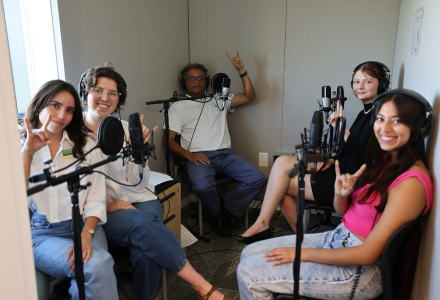 Honors affiliate faculty member Deepak Singh recording in a podcast studio wtih Honors students Fabiana Requena, Caroline Merriman, Amelie McLeod, and Daniella Charco