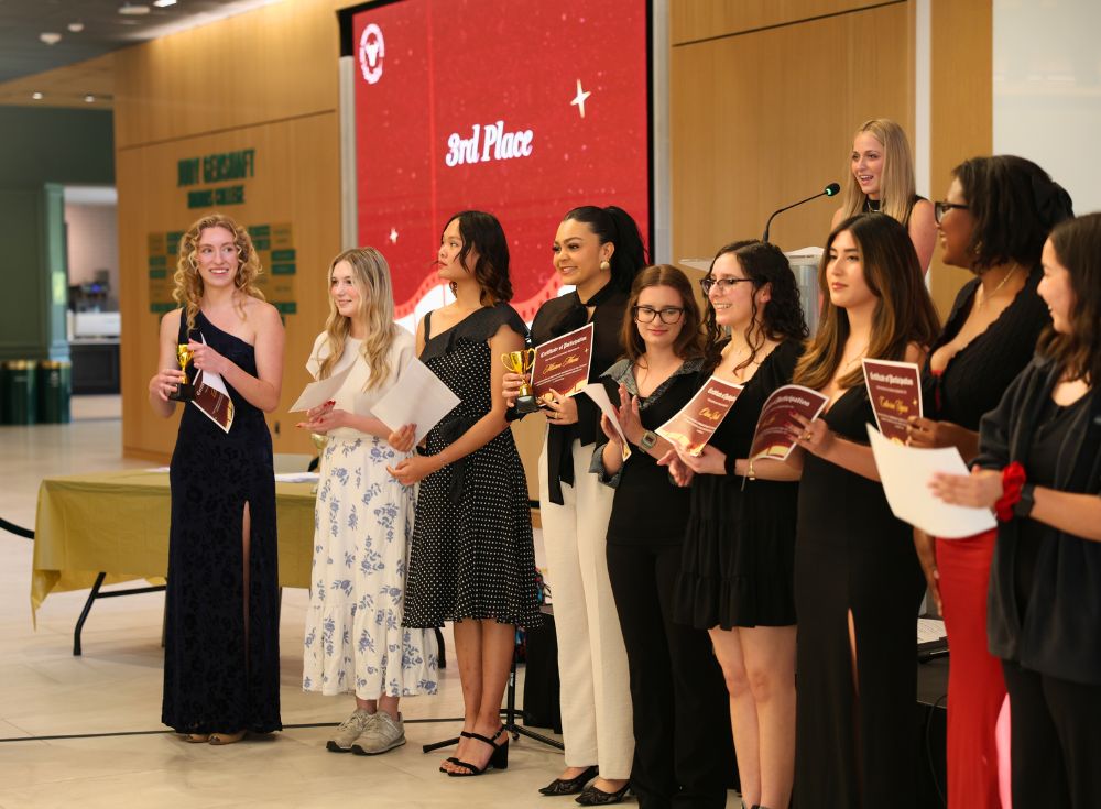Honors Got Talent performers pose with their awards as the judges announce the winners