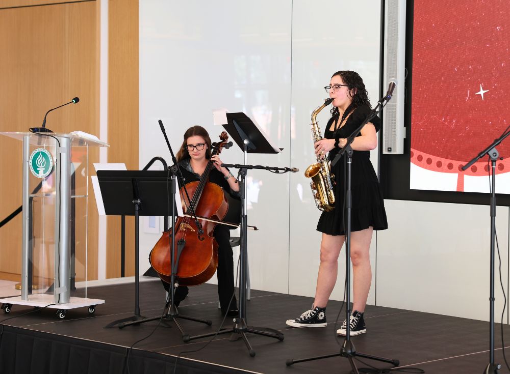 Olivia Pinilla and Grace Angeli perform a duet of libertango on the cello and saxophone.
