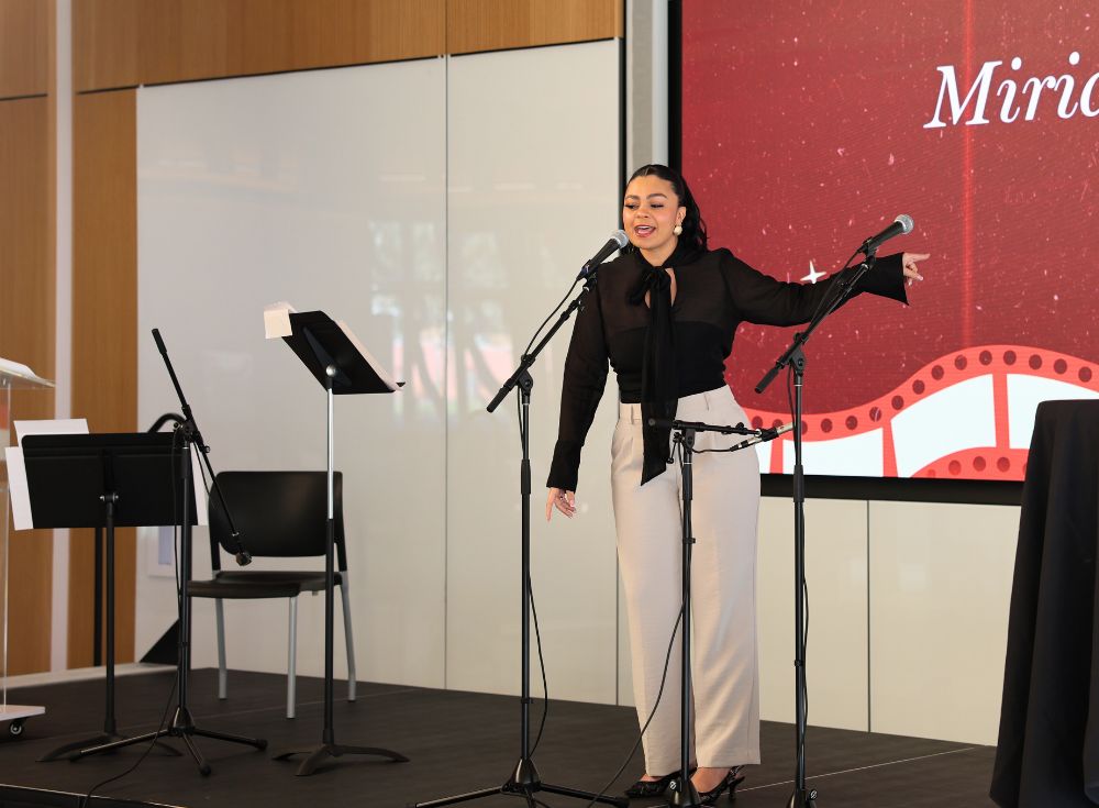 Miriam Mami, singing "Me and the Sky" by Jenn Colella