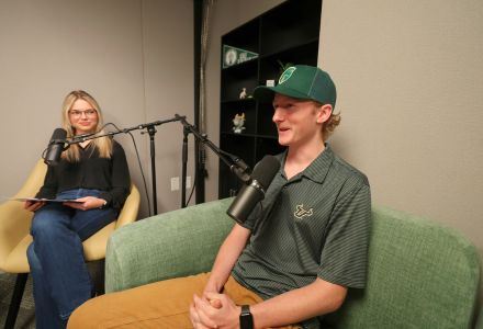 Adam Costello in podcast studio.