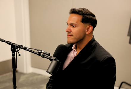 Alum Hiram Rios Hernandez on set for the Judy Genshaft Honor Roll Podcast.