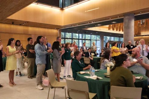 Honors alumni, Judy Genshaft, and Steve Greenbaum gather in the Honors forum to celebrate the launch of the Judy Genshaft Honors College Alumni Society.