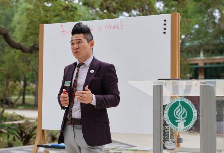 Andrew Hargrove giving a lecture outside the Honors building