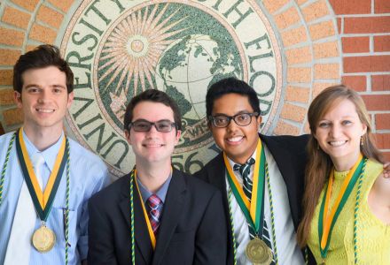 Bryce Montane posing with other Honors students at the Honors Graduate Celebration Ceremony