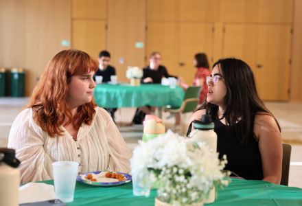 Participants of the Climate Teach-In discuss at the Climate Social Event