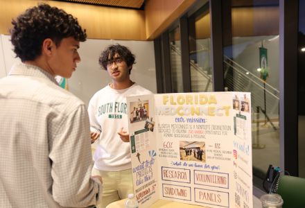 Shivanshu Kumar tabling for FL Medconnect at an event.