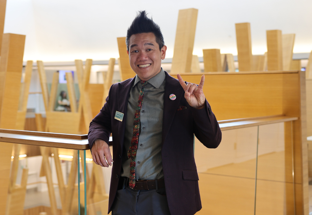 Dr. Andrew Hargrove smiles in the Honors College.