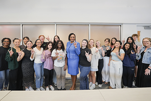 Leader Driskell poses with Honors students