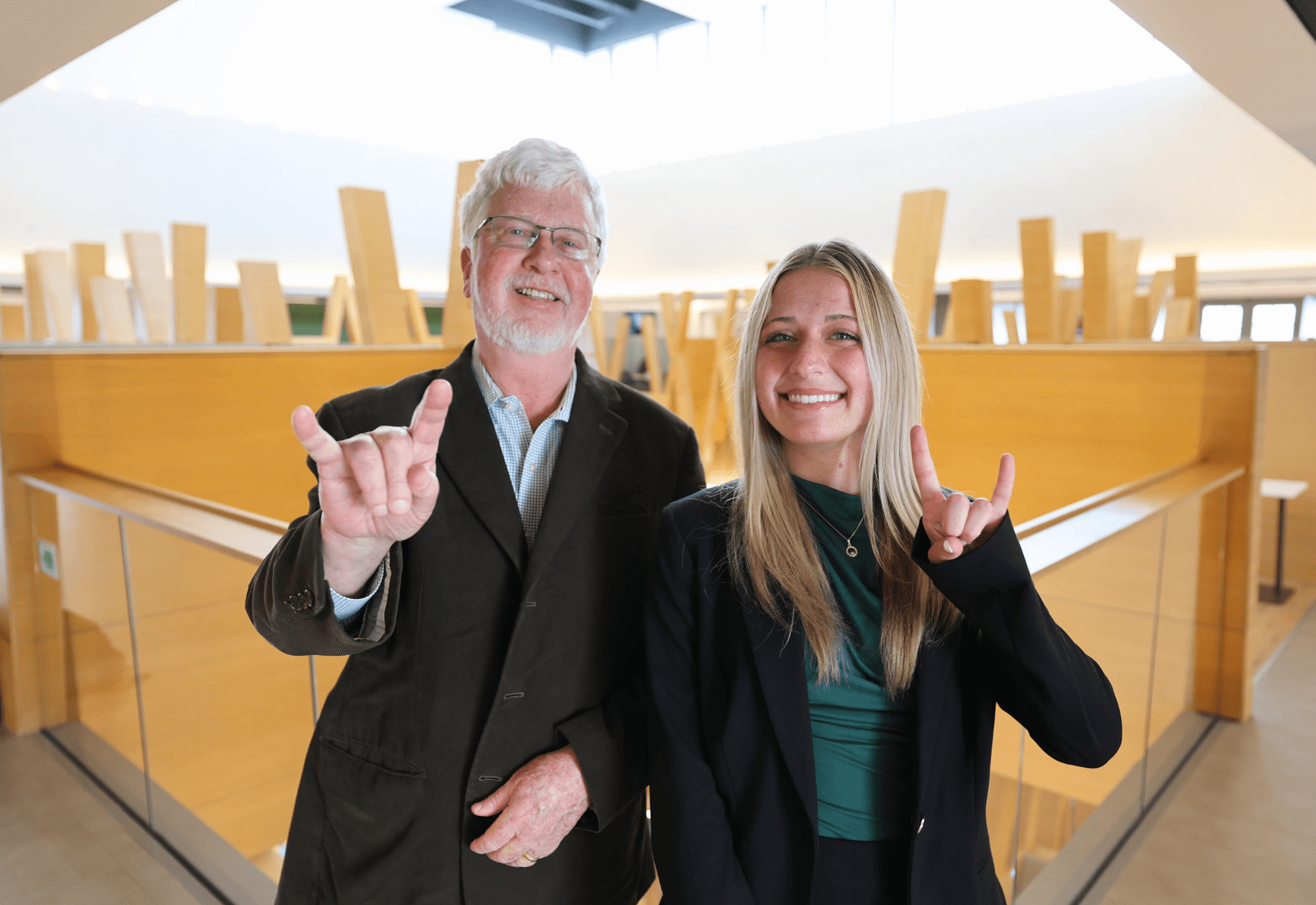 Dean Adams and Ava Tucker in Honors building