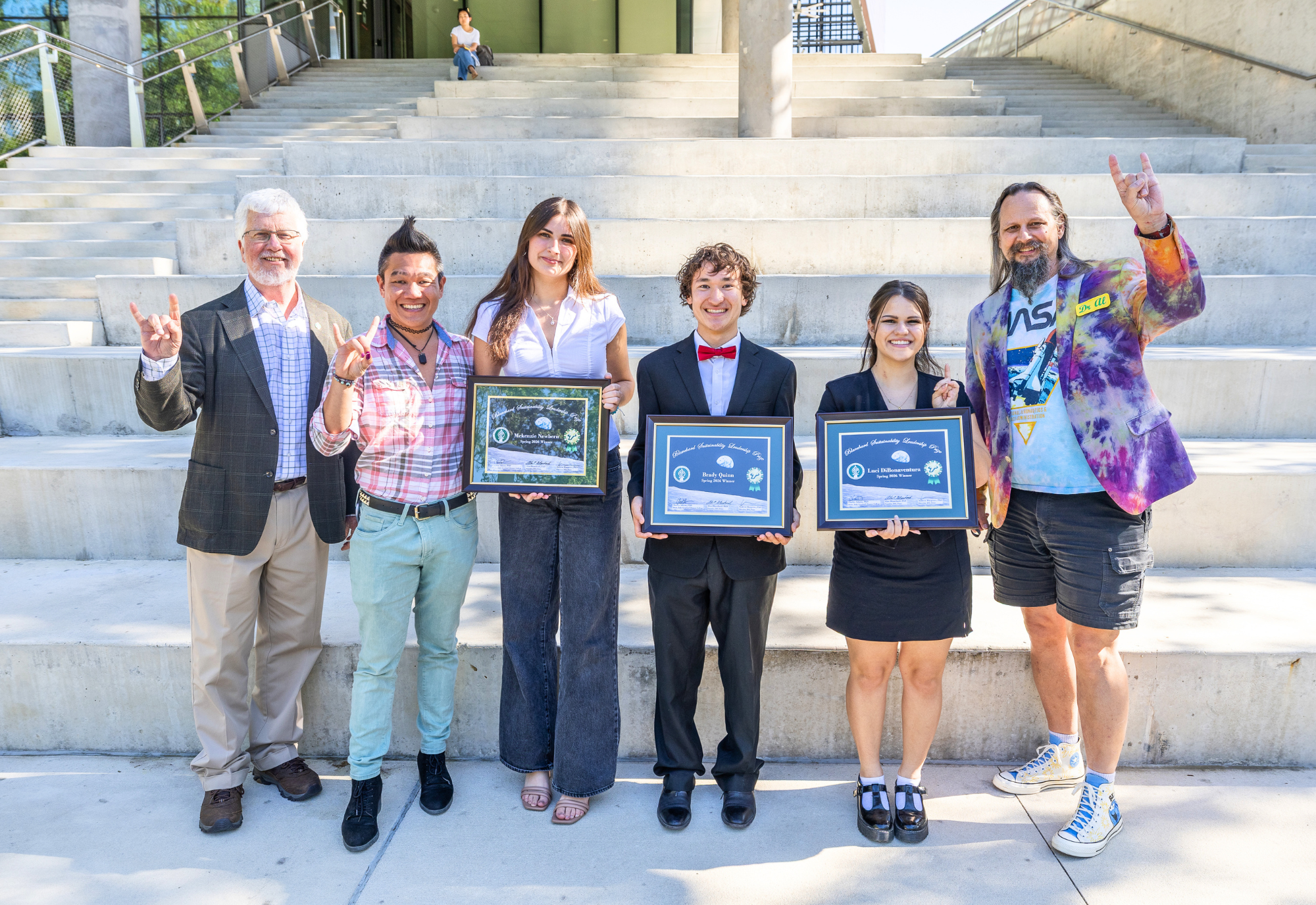 BSL Prize winners, Dean Adams, Dr. Andrew Hargrove, and Dr. Al Blanchard in front of the Honors amphitheater steps