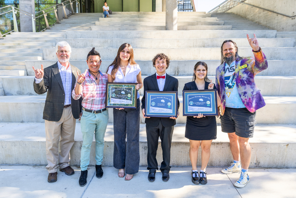 BSL Prize winners, Dean Adams, Dr. Andrew Hargrove, and Dr. Al Blanchard in front of the Honors amphitheater steps